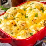 Loaded Cheesy Cauliflower Casserole dish recipe idea. Create an easy and simple vegetable side dish with cheese sauce for dinner, vegetarian.