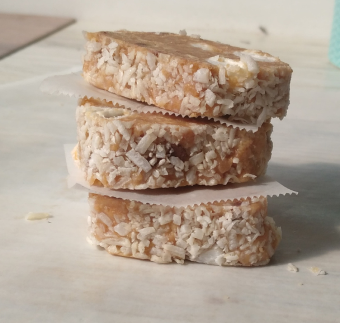 Marshmallow Fridge Cake Biscuits recipe idea for a dessert. A No Bake stove top recipe with biscuit and condensed milk, coconut coated.