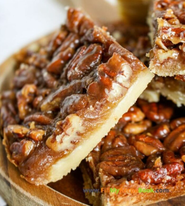 Easy Shortbread Pecan Bars recipe. A shortbread crust topped with pecan nuts, honey, cream and brown sugar for a healthy snack bar.