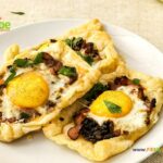 Quick Bacon and Egg Galettes recipe idea that is so easy to bake for breakfast, light supper. Fried Onion and cheese filling on puff pastry.