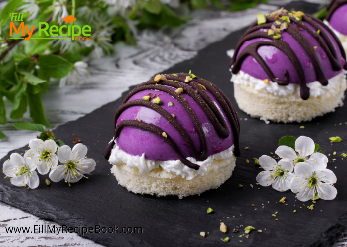 Mini Blueberry Mousse Cakes Glazed Recipe. A gelatin set dessert with a base of almond sponge cake with blueberry mousse fillings.