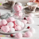 Mini Pink Meringue Kisses recipe idea. Pink meringues dessert with organic dried strawberry or raspberries powder or food coloring.