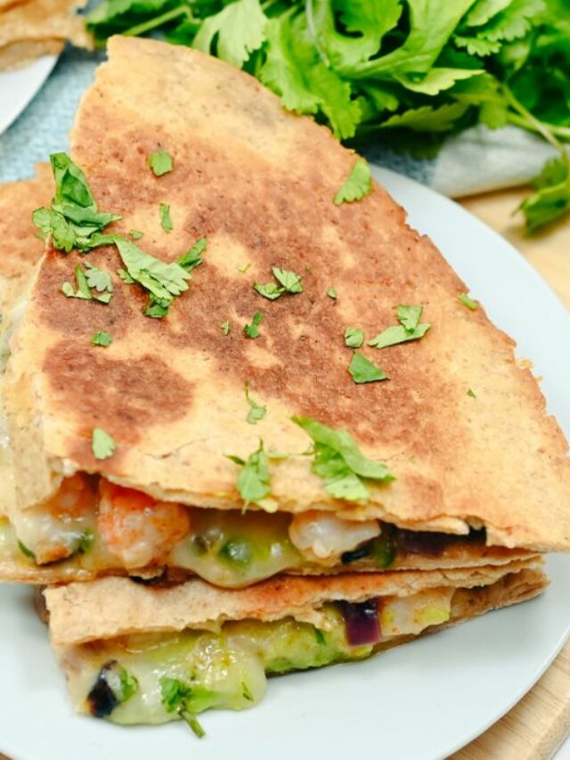 Spicy Tasty Keto Shrimp Quesadillas recipe idea to create for lunch or dinner. Pan sautéed shrimp and chili, cumin and jalapeño with avocado.