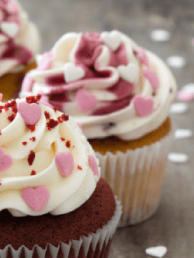 Valentines Vanilla Frosted Cupcakes recipe idea decorated with heart sprinkles, easy frosting ideas for kids to help decorate and serve.