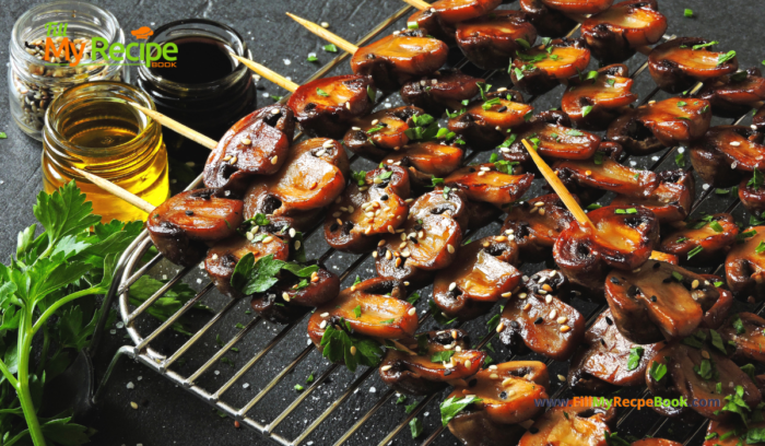 Grilled Sliced Button Mushroom Kebabs recipe idea for a braai or barbecue. A healthy and tasty side dish or appetizer on skewers for a meal.