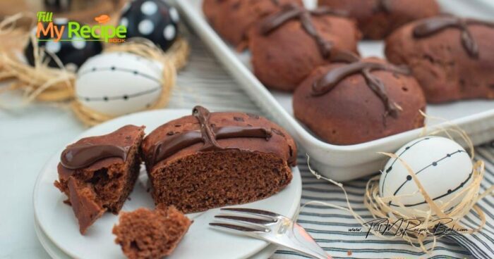 Serve the hot cross buns fresh on the day they are baked for the best flavor and texture, or store them at room temperature in a covered container or wrapped in a clean cloth for the family to enjoy on Good Friday. If they last that long! 😉