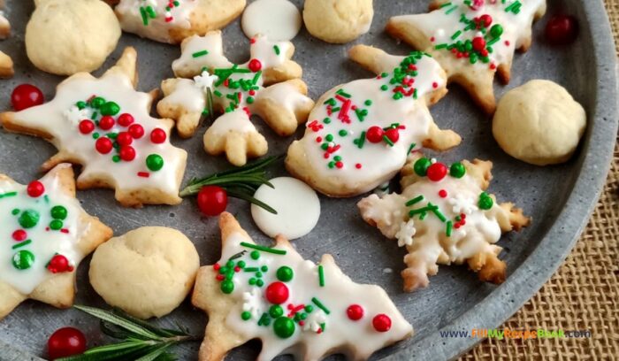 Cream Cheese Christmas Cookies recipe idea for snacks and treats. A melt in your mouth creamy soft biscuit or cookie decorated. Easter or Christmas cookie cut shapes.