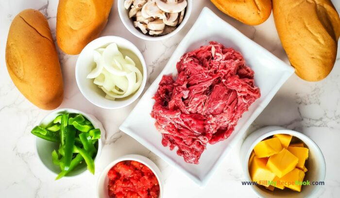 Ingredients, Homemade Cheesesteak Roll or sandwich recipe. The best easy idea for a roll up for lunch or a sub with melted cheese and sliced steak.