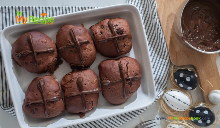 Chocolate Orange Hot Cross Buns recipe idea with a twist. A bread machine dough mix, oven baked buns orange glazed for Easter.