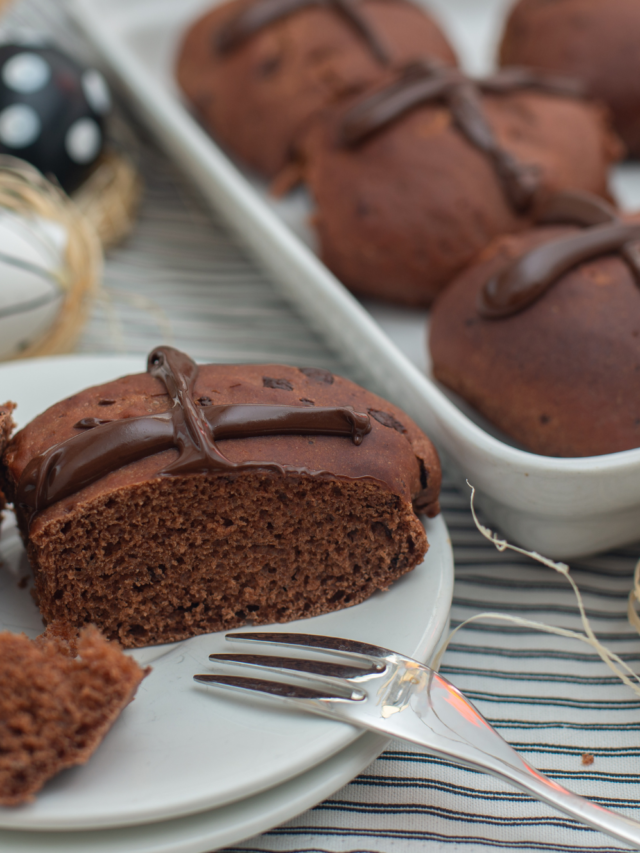 Chocolate Orange Hot Cross Buns recipe idea with a twist. A bread machine dough mix, oven baked buns orange glazed for Easter.