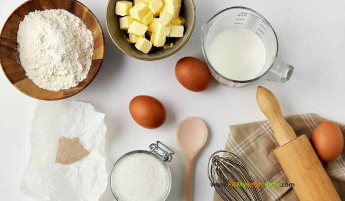 Basics, flour, butter, sugar, eggs, milk for easter hot cross buns. double chocolate easter buns.