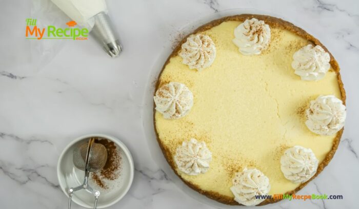 Easy Rumchata Cheesecake Recipe idea. Oven Baked with biscuit base and creamy liqueur flavor with cinnamon and cream topping for dessert.