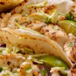 Fish Tacos with Slaw Lemon Zest recipe idea. An easy taco dish with left over fish and cabbage slaw with cilantro and dressing for a lunch.