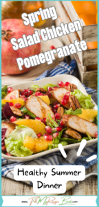 Spring Salad Chicken Pomegranate recipe idea for summer. Healthy dinner has orange, nuts, lettuce and dressing with honey.