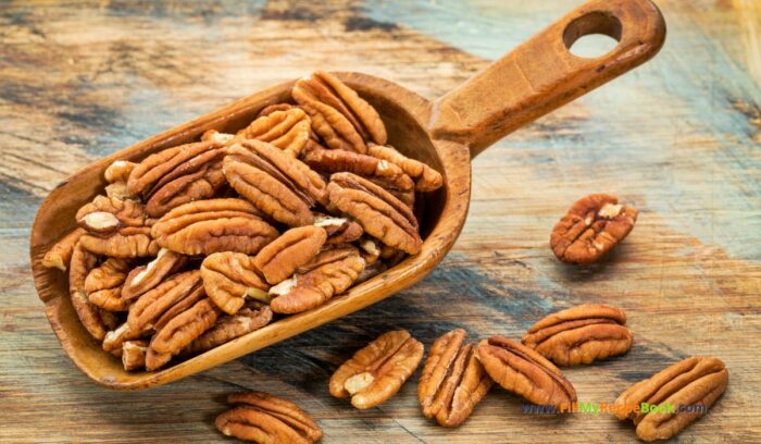 pecan nuts, Spring Salad Chicken Pomegranate Honey recipe idea for summer or spring. Healthy side dish has orange, nuts, lettuce and a drizzle of honey.