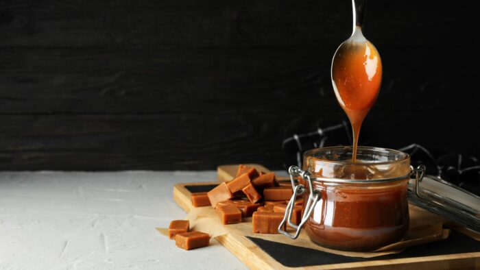 Sticky Date Pudding and Sauce recipe. Easy warm fine dining muffin dessert idea known as sticky toffee pudding, with butterscotch sauce.