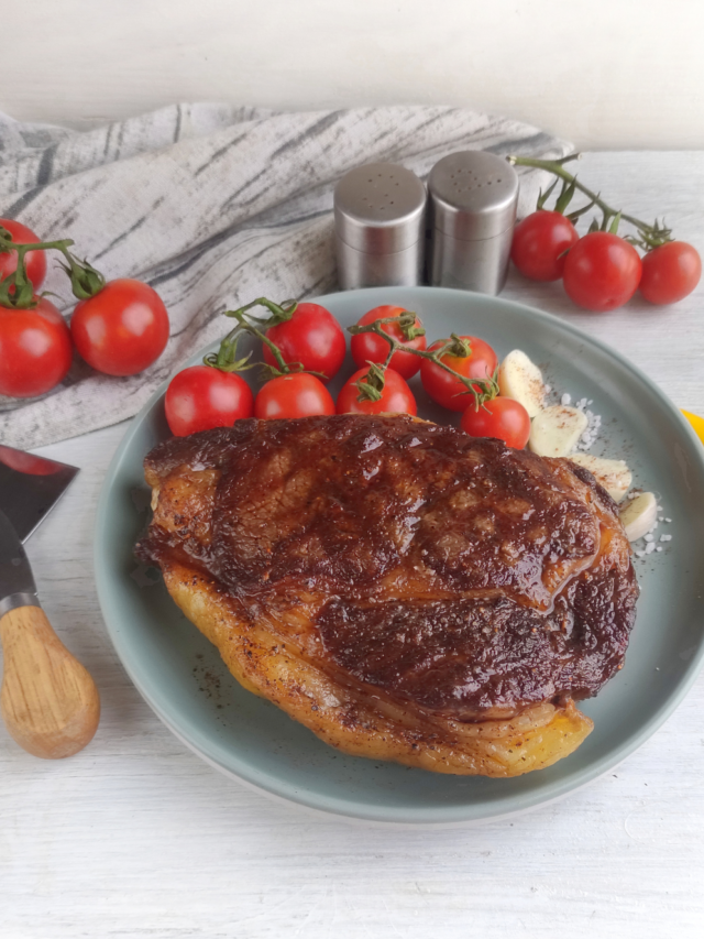 Best Grilled Ribeye Steak recipe in a cast iron pan. Easy stove top idea for dinner or lunch as the steak is grilled with butter, garlic.