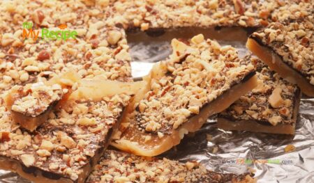 Homemade Chocolate Toffee Almond Bars on a shortbread base recipe. An easy candy topped cookie bar that taste like toffee, with nuts for snacks.