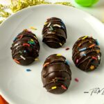 Marshmallow Chocolate Eggs Recipe with cookie butter. Best DIY homemade idea with a mold, filled marshmallow fluff, decorated with sprinkles.
