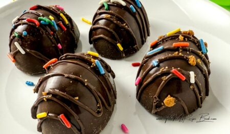 Marshmallow Chocolate Eggs Recipe with cookie butter. Best DIY homemade idea with a mold, filled marshmallow fluff, decorated with sprinkles.
