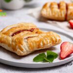 Strawberry Puff Pastry Dessert recipe idea. Quick and easy sweet homemade jam pastry 3 ingredient tart to Oven bake for tea time.