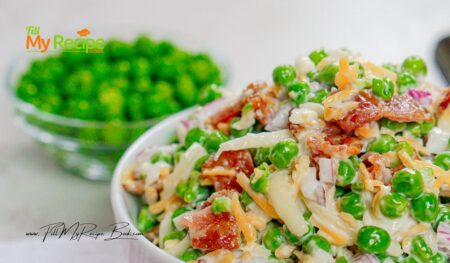 Create a Easy Pea Salad with Bacon recipe, featuring cheese and dressed with mayonnaise, perfect as a refreshing cold green summer salad.