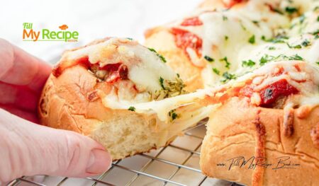 Easy Pull Apart Meatball Sliders recipe. Use Hawaiian rolls, cheese, and drizzle with garlic, Italian herbs in butter before baking in oven.