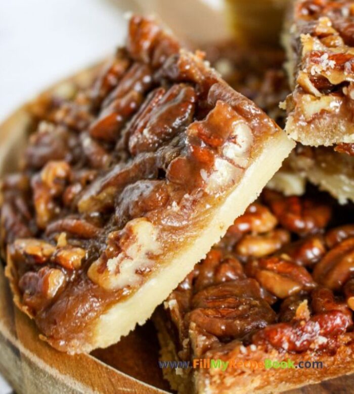 Easy Shortbread Pecan Bars recipe. A shortbread crust topped with pecan nuts, honey, cream and brown sugar for a healthy snack bar.