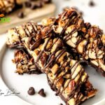 A chewy healthy chocolate Homemade Granola Nut Bars recipe. Easy and quick idea for oven baked snack or treat with honey, coconut oil, oats.