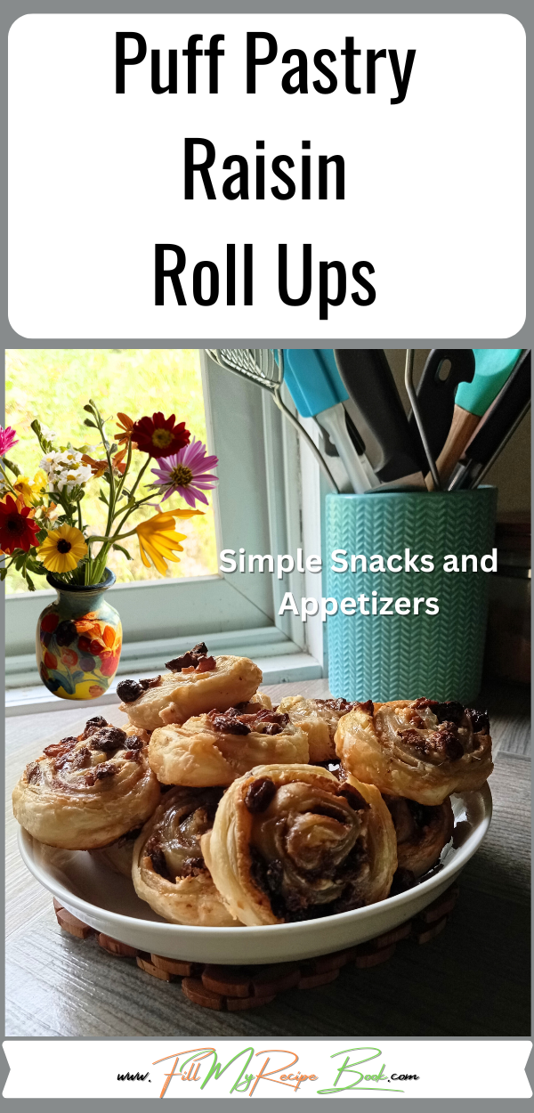 Easy Puff Pastry Raisin Roll Ups recipe idea with cream cheese. A delicious simple treat to bake in the oven with cinnamon and flaky pastry.