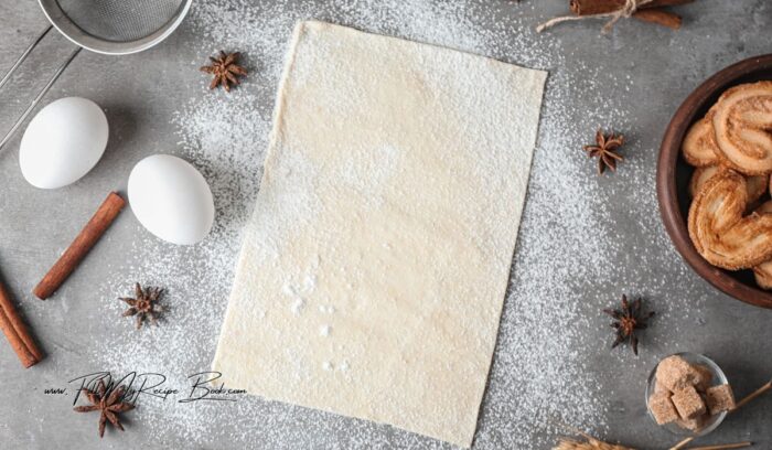 Roll out your defrosted roll of puff pastry. Open it up on the paper, or place it on a floured surface. (do not leave it to long at room temperature, as it will be difficult to work with)