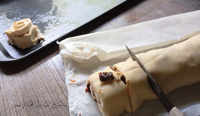 Once it has been in the fridge it will be easier to work with. Slice the roll in half an inch slices. Not to thick.