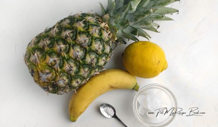 Ingredients for Simple Healthy Pineapple Smoothie.
pineapple, banana, lemon, salt and ice.