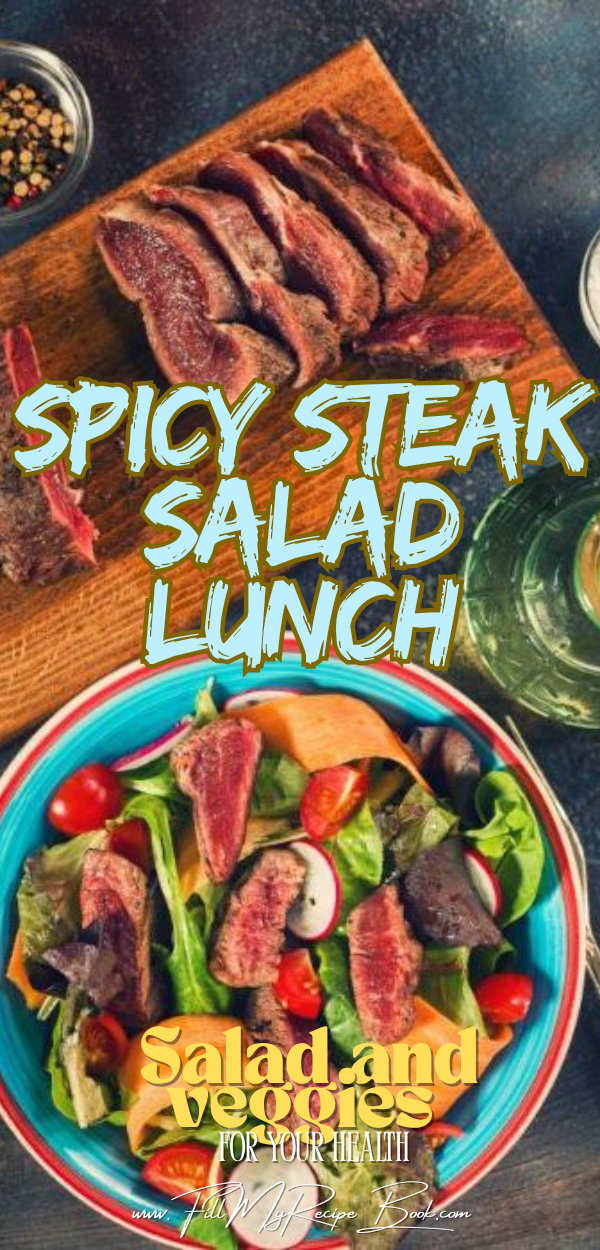 A delicious spicy steak salad lunch recipe for summer. Healthy bowl of veggies and cherry tomatoes on a lettuce, baby spinach bed and a simple dressings.