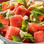Strawberry Watermelon Feta Salad recipe idea for a refreshing and easy cold side dish for summer that is sweet and salty with a dressing.