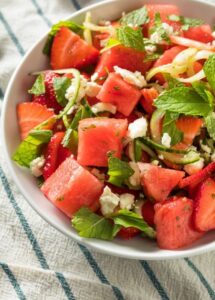 Strawberry Watermelon Feta Salad recipe idea for a refreshing and easy cold side dish for summer that is sweet and salty with a dressing.