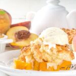 Delicious Homemade Peach Cobbler Recipe made with fresh fruit and baked in two small oven dishes. A simple, comforting dessert perfect for summer.