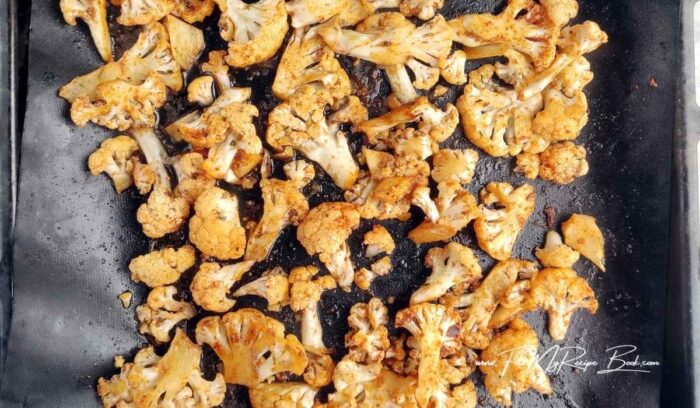Preheat the oven to 200 deg. C (395 deg. F.) Roast the cauliflower in the oven for 20–25 minutes until golden brown on a nonstick mat or parchment paper. Stir occasionally to ensure even baking.