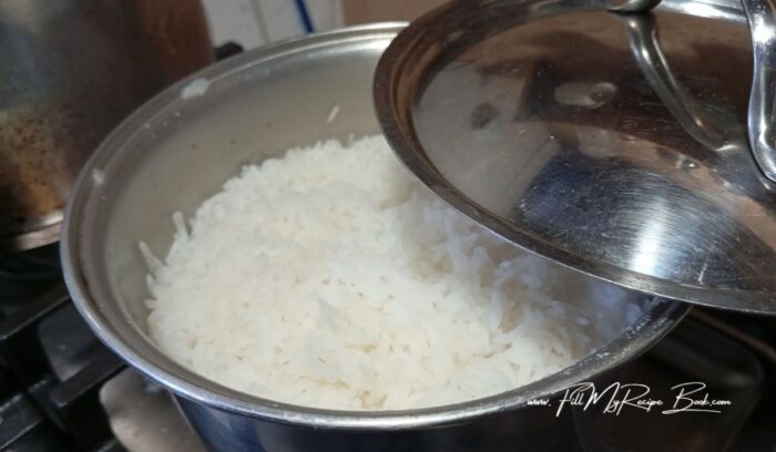 While you simmer the ground beef, cook the rice. Add a cup of soaked clean rice to a pot and add 2 cups of water and some salt and bring to boil. Turn down the heat and simmer the rice with the lid on until all the liquid has been soaked up.