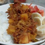 Family friendly Hearty Ground Beef Curry Over Rice recipe with potatoes and carrots. This easy, dinner is full of flavor and perfect for cozy weeknights.