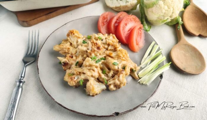 Mac and cheese cauliflower can be served in a baking dish. Complement the dish with sliced fresh tomatoes and herbs and enjoy a meal that won't harm your figure.