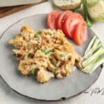Homemade creamy cauliflower mac and cheese with cheese sauce. An oven baked spicy cheesy, low-carb comfort food for dinner.