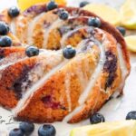Glazed Lemon Blueberry Bundt Cake recipe with yogurt for a dessert. Easy homemade dessert that is moist and flavorful baked in 60 minutes.