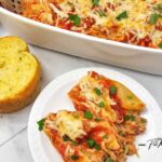 A cozy creamy Italian sausage stuffed shells recipe with three cheeses and marinara is the ultimate comfort food for dinner on busy nights.