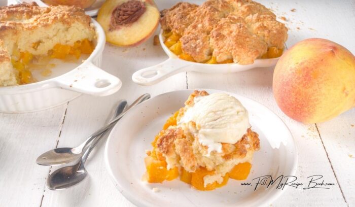 Delicious Homemade Peach Cobbler Recipe made with fresh fruit and baked in two small oven dishes. A simple, comforting dessert perfect for summer.