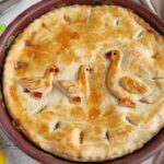 Cozy homemade turkey pot pie recipe with tender turkey, veggies, and creamy filling baked under a golden flaky crust. Perfect for holiday leftovers.