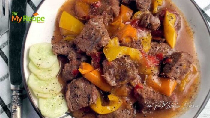 Tender beef, bell peppers, and onions simmered in a savory sauce. A crock pot pepper steak meal that is an effortless dinner recipe. Perfect for busy nights.