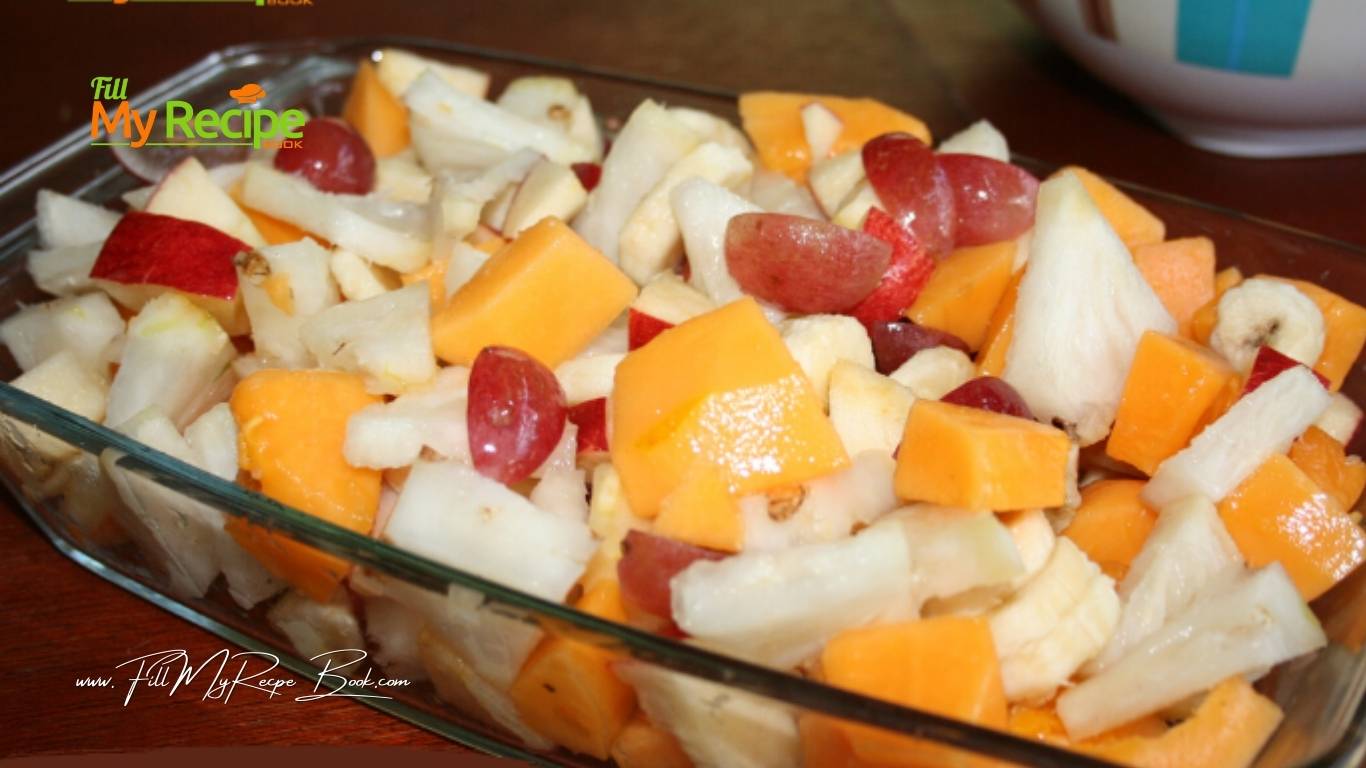Easy Fresh Fruit Salad recipe of the day. A simple homemade healthy summer dessert idea to serve with a dressing for family.