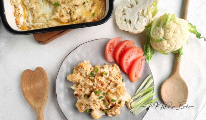 Homemade creamy cauliflower mac and cheese with cheese sauce. An oven baked spicy cheesy, low-carb comfort food for dinner.