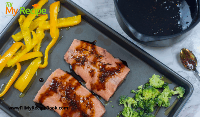 Best Molasses Glazed Oven Baked Salmon Recipe. A seafood dinner with vegetables and rice. Soy and molasses sauce make an amazing glaze.